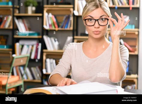 Attractive Female Librarian At Work Stock Photo Alamy