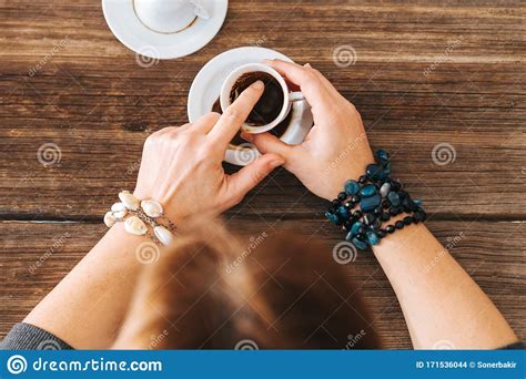 Woman Hold The Mug And Telling Fortune With Traditional Turkish Coffee