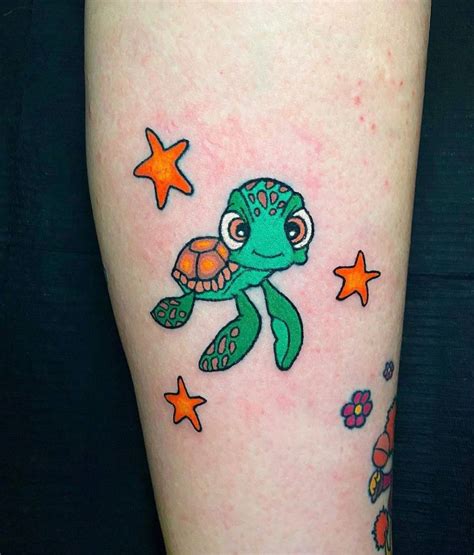 Hand Poked Squirt Tattoo Located On The Calf