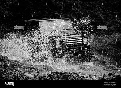 Off Road Travel On Mountain Road Mud And Water Splash In Off The Road