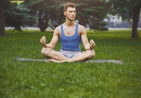 Young Man Practicing Yoga Relax Meditation Pose Stock Photo Image Of