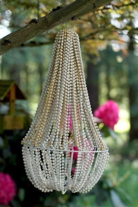 I pulled together some items i found at the flea market and make my own chandelier. Craft Of The Day: A DIY Beaded Chandelier | HuffPost