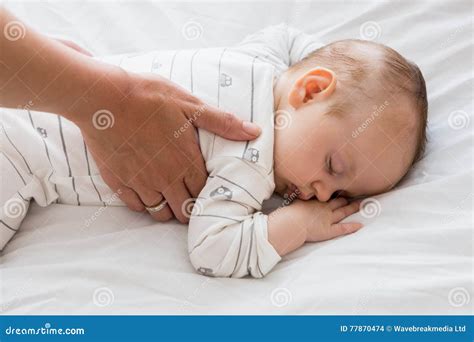 Mom Putting Baby To Sleep In Baby Bed Stock Photo Image Of Apartment