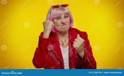 Aggressive Angry Senior Granny Woman Trying To Fight At Camera Shaking Fist Boxing Punishment