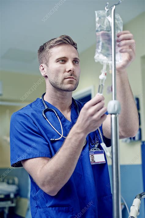 Doctor Adjusting Intravenous Drip Stock Image F0098961 Science