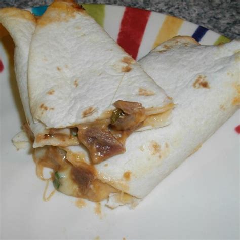 I used tomatillo salsa for the pork and enchilada sauce on top. Leftover Pork Roast BBQ Wrap Photos - Allrecipes.com