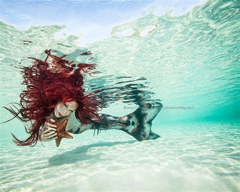 Redhead Mermaid With Sea Star In Shallow Water Model Iara Mandyn