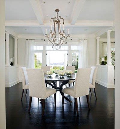 Modern, fresh and a real space saver!. Dark hardwoods and furniture combined with white ...