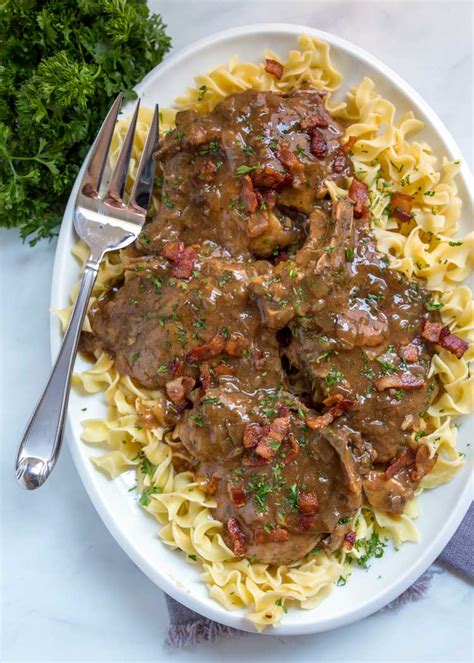 Another benefit of using a slow cooker is flexibility. Slow Cooker Smothered Pork Chops - Kevin Is Cooking