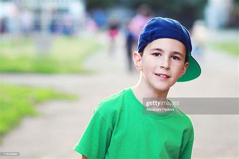 Cute Boy Wearing Baseball Cap Backwards High Res Stock Photo Getty Images