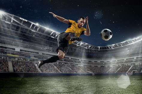 Professional Male Football Soccer Player On Stadium Background