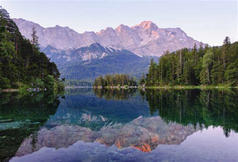 Scenic View Of Eibsee Lake With Wetterstein And Zugspitze In Background