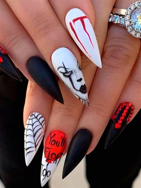 Amazing Spooky Nails Consist Of Stiletto Shaped It Nails Accent Spider