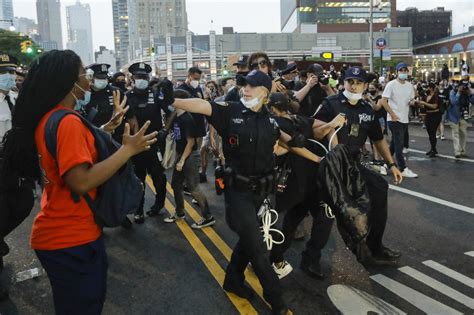 Officer Warns A Protester During An Arrest At A Rally Friday May 29