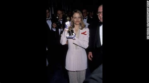 Jodie Foster Holds Up Her Second Oscar This One For Her Role In The