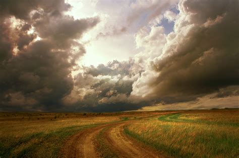 Storm Clouds Over The Landscape By Larisa Koshkina