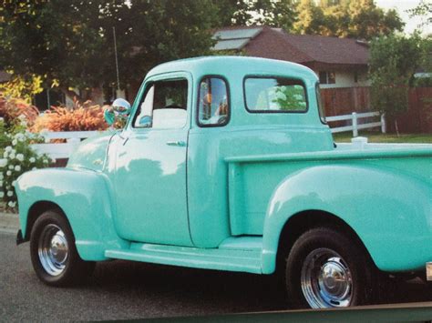 turquoise classic truck pictured in romantic prairie style by fifi o neill gmc trucks old