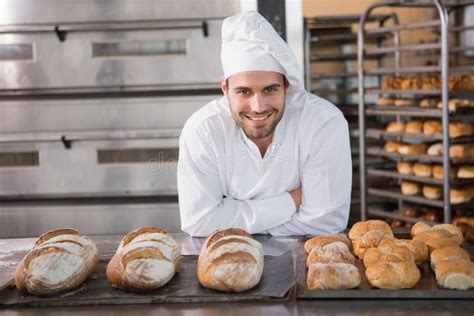 Happy Baker Standing Near Tray With Bread Stock Image Image Of Baker