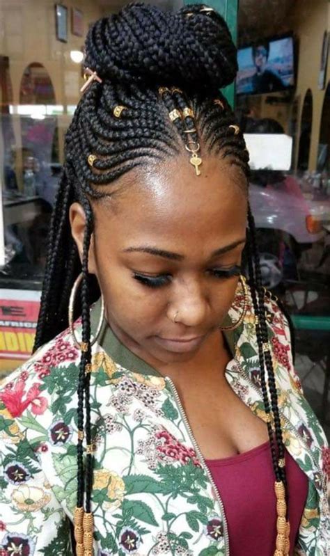 The hair is curly and looks exceptional braided. Gorgeous Braided Hairstyles With Beads You Need To Try Out ...