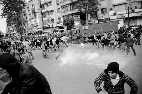 Police troops fire tear gas on Tahrir protesters قوات الأم Flickr