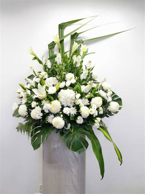 Same day flower delivery available in london. White Sympathy CW24 - FREE Same Day Flower Wreath ...