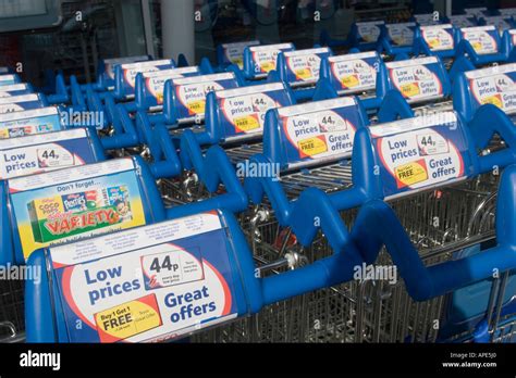 Tesco Shopping Trolleys Carts With Advertising Panels Stock Photo Alamy