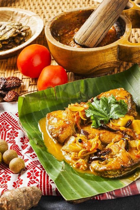 Masor Tenga Or Tangy Fish Curry Recipe