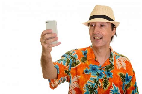 Premium Photo Happy Mature Man Smiling And Taking Selfie With Mobile Phone