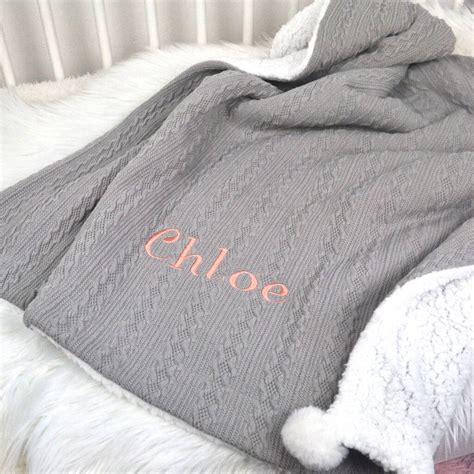 Personalised Grey Knitted Blanket With Pom Pom By D Caro