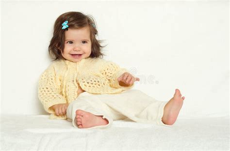 Happy Little Child Girl Sit On White Towel Happy Emotion And Face