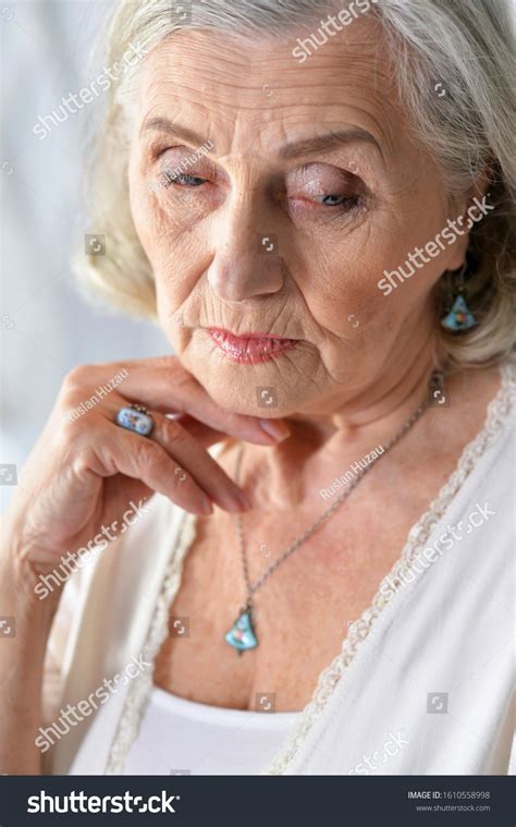 Close Portrait Sad Senior Woman Posing Stock Photo 1610558998