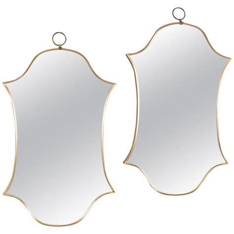 Double Shield Form Modernistic Brass Frame Mirrors At 1stdibs