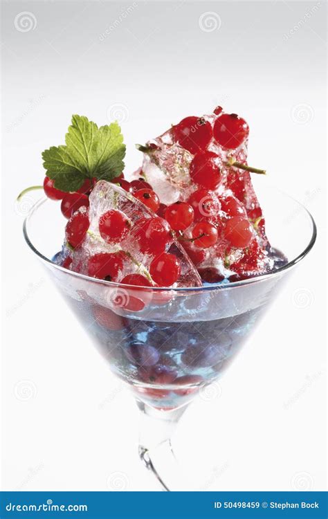 Cocktail Glass With Blue Curacao And Frozen Red Currants Stock Image Image Of Frost Glossy