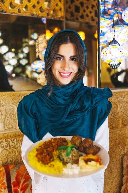Free Photo Woman Holding Dish Of Arab Food