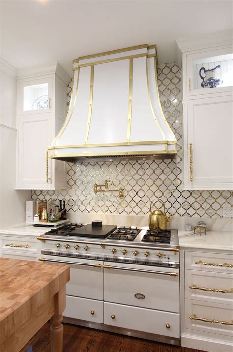 White And Gold Kitchen Gold Hardware White Cabinets And White Range