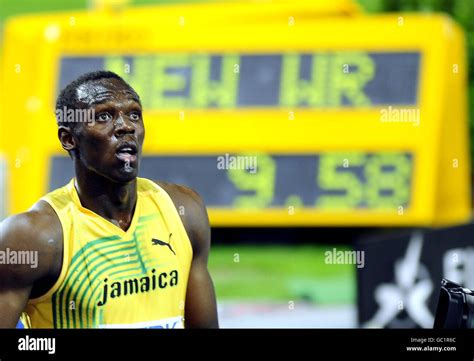jamaica s usain bolt wins the men s 100m final in a new world record time of 9 58 seconds during