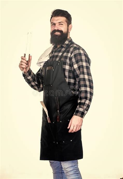 Barbecue And Grill Barbecue Cook Using Kitchen Tongs Bearded Man Holding Barbecue Tongs In