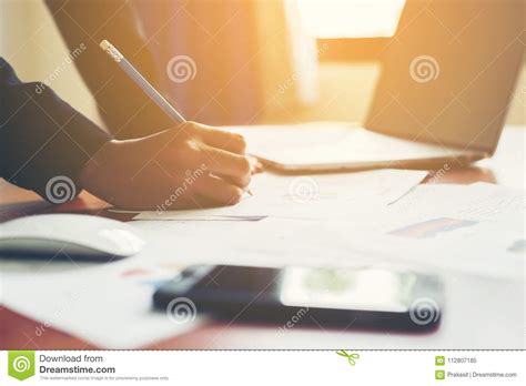 Hands Of Business Woman Financial Manager Taking Notes When Work Stock