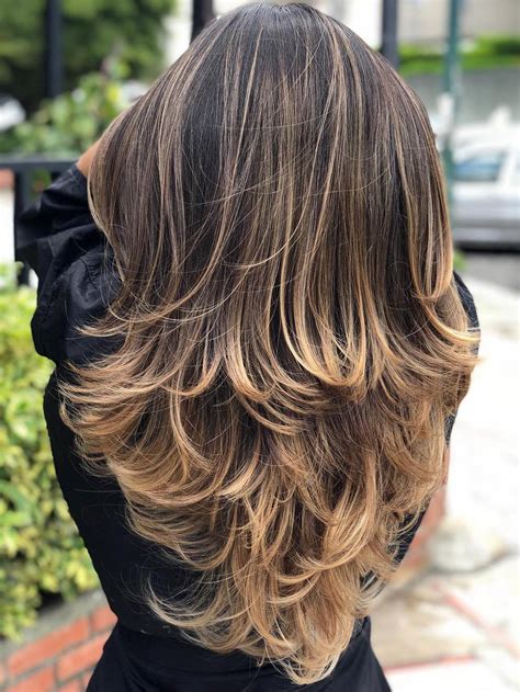 Apply some mousse from your roots to the ends and flip the latter out using both a blow dryer and a round brush! 40 Trendy Hairstyles and Haircuts for Long Layered Hair To ...