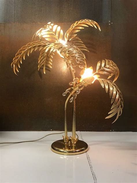 Of course, the most basic purpose of a lamp is to provide light. Manufacturer unknown - vintage gilt brass palm tree lamp ...