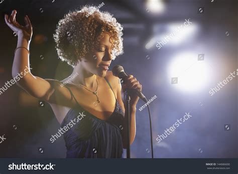 Beautiful African American Female Jazz Singer On Stage Stock Photo