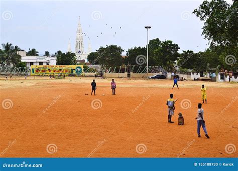 Indian Boys Playing Cricket Game On The Playground In Park Editorial