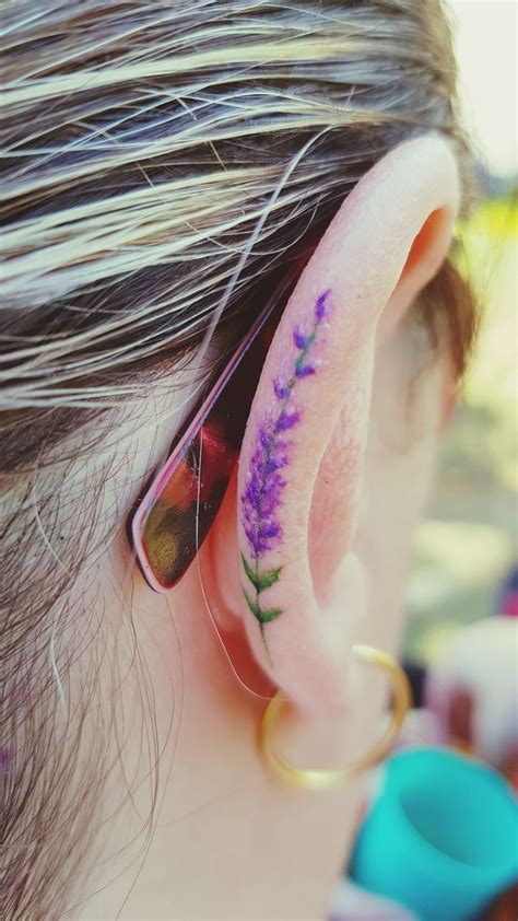 11 tattoos for moms who aren t afraid to show some ink covered skin purple tattoos tasteful