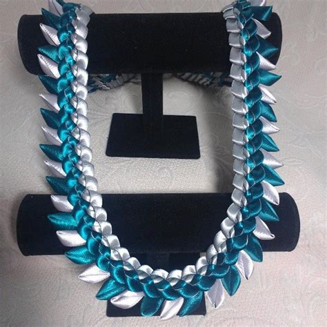 Ribbon leis are a perfect gift for many occasions. Ribbon Lei - "Lawakua" | Ribbon lei, Graduation leis diy, Graduation leis