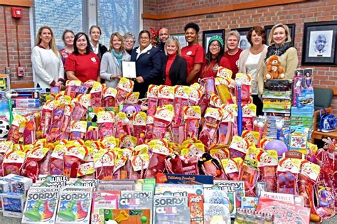 Del Tech Business Honor Society Fills Stockings For Salvation Army Cape Gazette