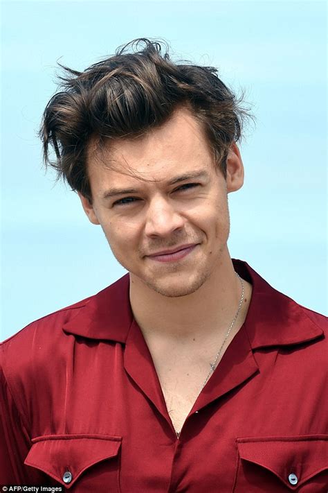 With christopher nolan's 'dunkirk' now filming, star harry styles finds himself the subject of set photos, revealing his 'dunkirk': Harry Styles giggles at Dunkirk photocall in France | Daily Mail Online