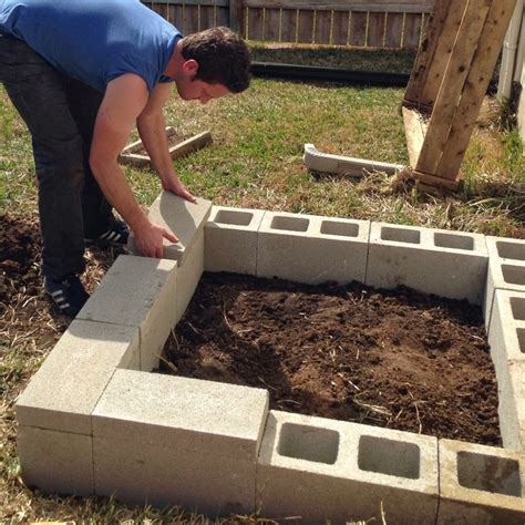 Raised bed gardens minimize soil compaction and promotes healthy root growth. DIY Cinder Block Raised Garden Bed | Fab Everyday