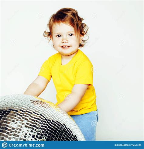 Little Cute Adorable Baby Girl Holding Disco Ball Isolated On White