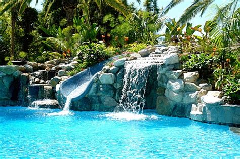 Charming And Spectacular Pool Waterfalls To Fashion Every Backyard Landscape