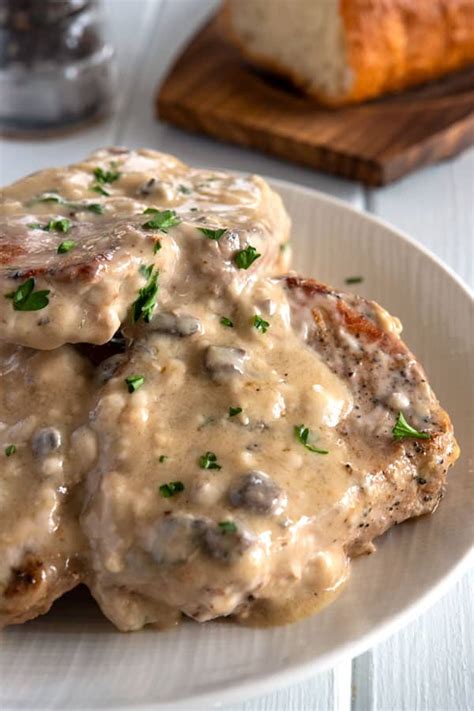 Place 5 medium pork chops in a 9 by 12 inch baking pan. Cream of Mushroom Pork Chops BAKED | Kitchen Gidget